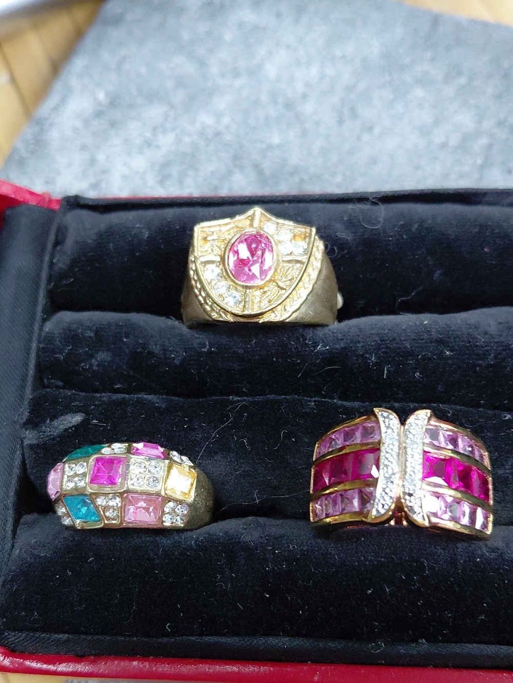 Three Assorted Colorful Statement Rings Of Various Sizes And Stones